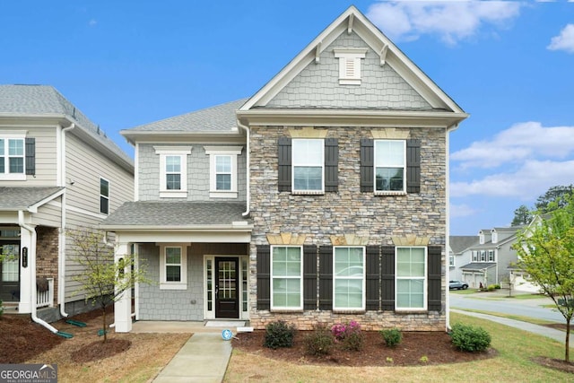 3514 Ambassador Aly, Scottdale, GA 30079 - view of front of property with roof with shingles and stone siding