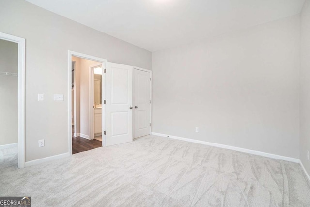 3514 Ambassador Aly, Scottdale, GA 30079 - unfurnished bedroom with a closet, baseboards, and carpet