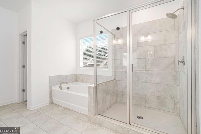 3514 Ambassador Aly, Scottdale, GA 30079 - full bathroom with a shower stall, tile patterned flooring, a bath, and baseboards