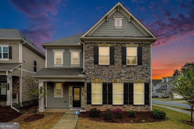 3514 Ambassador Aly, Scottdale, GA 30079 - view of front of property with a shingled roof and stone siding