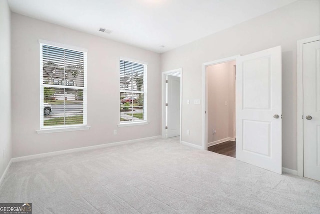 3514 Ambassador Aly, Scottdale, GA 30079 - unfurnished bedroom featuring visible vents, baseboards, and carpet floors