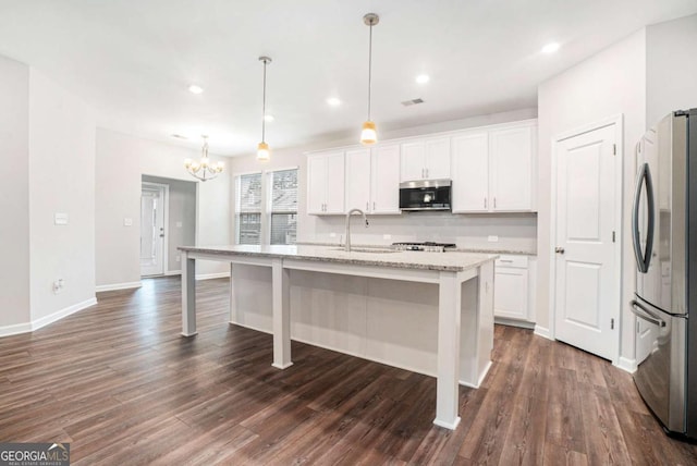 3514 Ambassador Aly, Scottdale, GA 30079 - kitchen with a notable chandelier, dark wood-style floors, white cabinets, appliances with stainless steel finishes, and a sink