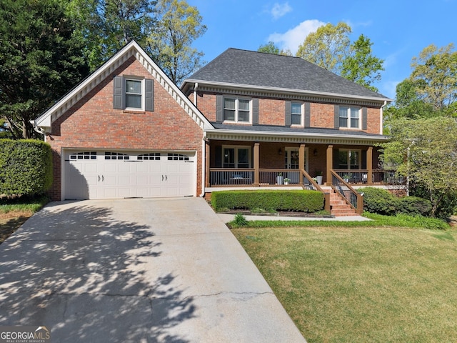 view of front of property featuring covered porch, driveway, brick siding, and a front yard