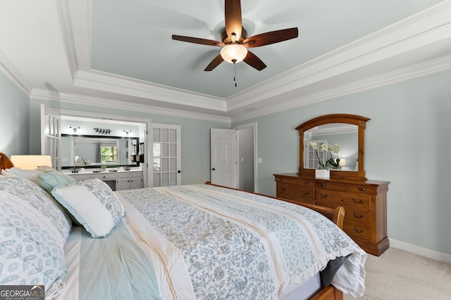 bedroom featuring a raised ceiling, a ceiling fan, and ornamental molding