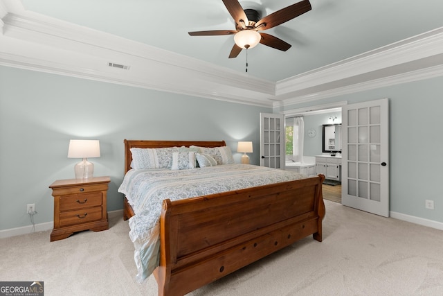 bedroom featuring a raised ceiling, visible vents, ornamental molding, and light carpet