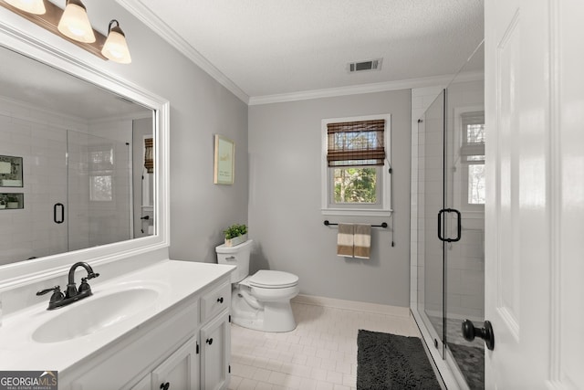 full bathroom featuring a stall shower, visible vents, tile patterned flooring, crown molding, and vanity