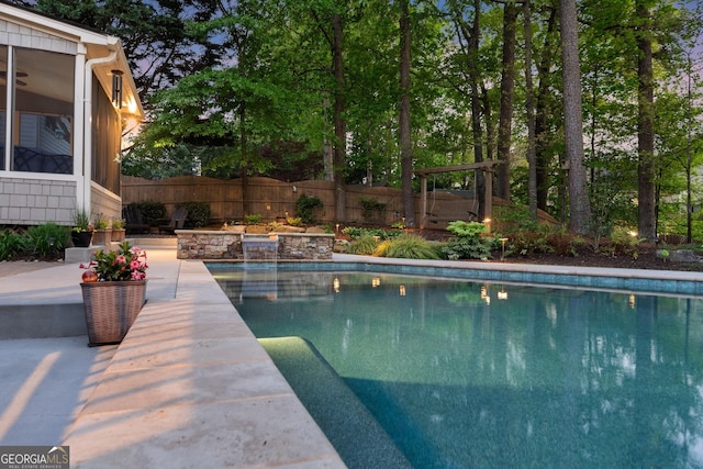 view of pool featuring a fenced in pool and fence
