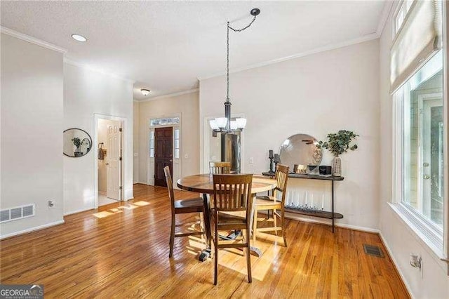 230 Oakmere Dr, Alpharetta, GA 30009 - dining room with visible vents and ornamental molding