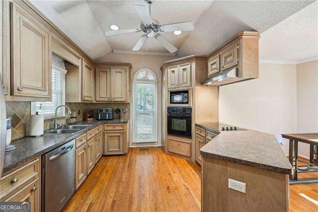 230 Oakmere Dr, Alpharetta, GA 30009 - kitchen with a peninsula, black appliances, under cabinet range hood, a sink, and dark countertops
