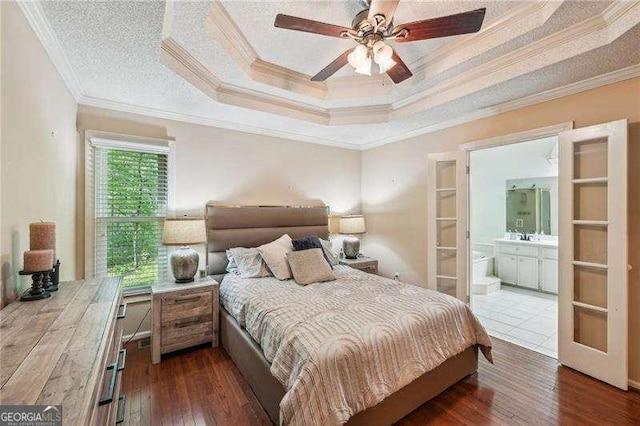 230 Oakmere Dr, Alpharetta, GA 30009 - bedroom featuring dark wood-style flooring, ceiling fan, connected bathroom, and crown molding