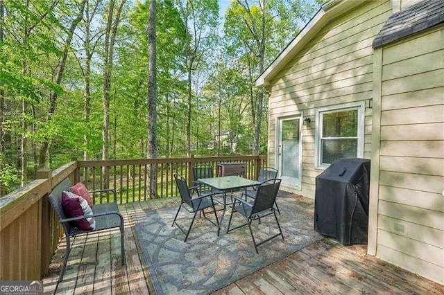 230 Oakmere Dr, Alpharetta, GA 30009 - wooden deck featuring outdoor dining space and a grill