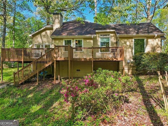 230 Oakmere Dr, Alpharetta, GA 30009 - rear view of property featuring a chimney, a deck, and stairs