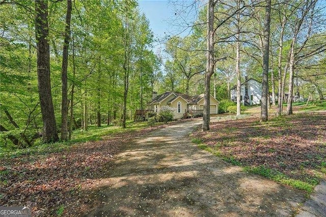 230 Oakmere Dr, Alpharetta, GA 30009 - view of front facade with aphalt driveway and a garage