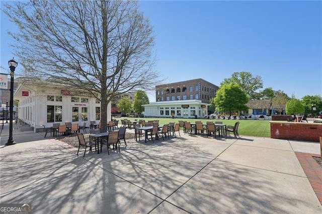 230 Oakmere Dr, Alpharetta, GA 30009 - view of home's community featuring a yard and a patio area