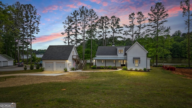 1001 Sugar Hill Way, Buckhead, GA 30625 - modern inspired farmhouse featuring an outdoor structure, board and batten siding, concrete driveway, a yard, and stairway