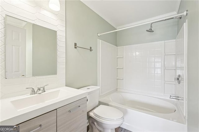 full bath with toilet, vanity, and  shower combination