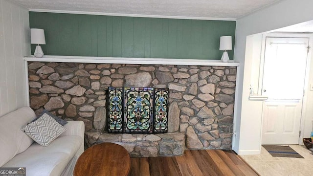 details with ornamental molding and wood finished floors