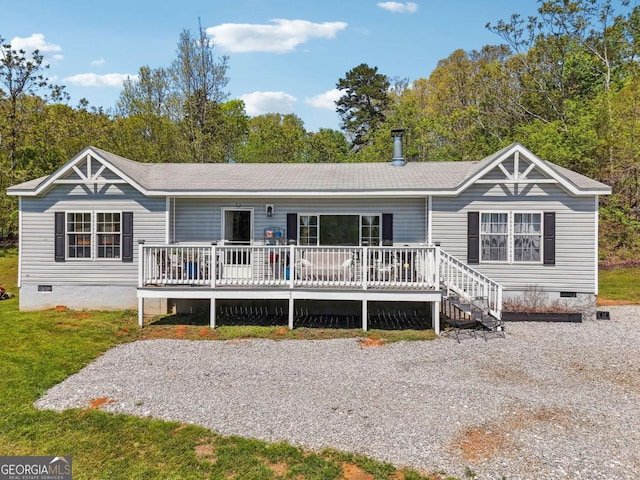 2496 Venture Dr, Gainesville, GA 30506 - rear view of house with a lawn, a deck, and crawl space
