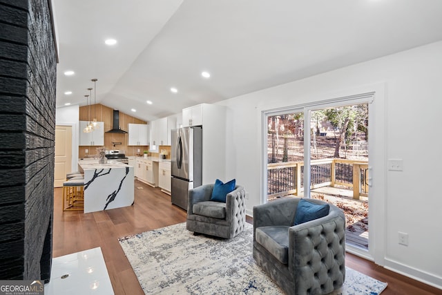 living room featuring baseboards, recessed lighting, vaulted ceiling, and dark wood finished floors
