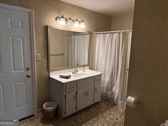 full bathroom with vanity