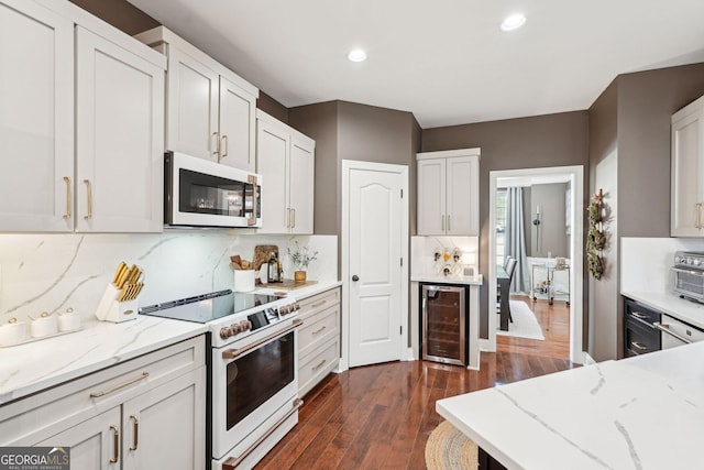 185 Starlight Dr, Dahlonega, GA 30533 - kitchen with tasteful backsplash, wine cooler, dark wood-type flooring, and white appliances
