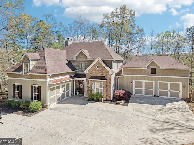 185 Starlight Dr, Dahlonega, GA 30533 - craftsman inspired home with concrete driveway, a chimney, and roof with shingles