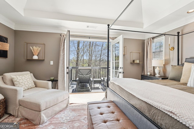 185 Starlight Dr, Dahlonega, GA 30533 - bedroom featuring a raised ceiling, access to outside, and crown molding