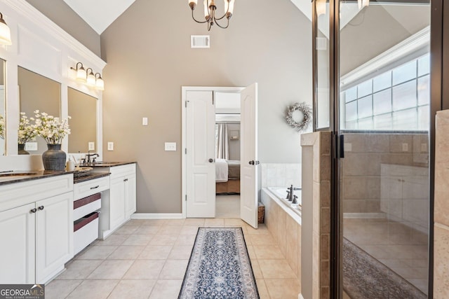 185 Starlight Dr, Dahlonega, GA 30533 - bathroom featuring visible vents, tile patterned floors, high vaulted ceiling, and a shower stall