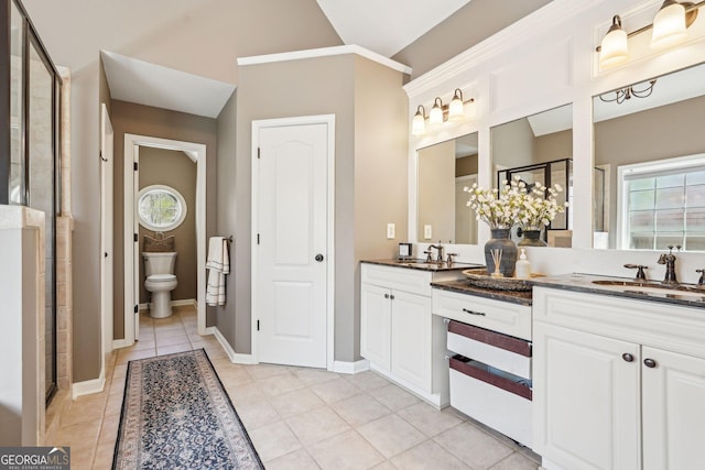 185 Starlight Dr, Dahlonega, GA 30533 - bathroom with a shower stall, tile patterned floors, double vanity, and a sink
