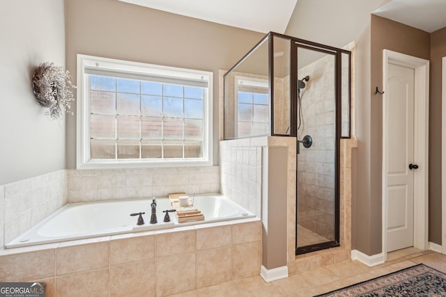 185 Starlight Dr, Dahlonega, GA 30533 - bathroom featuring tile patterned floors, a stall shower, and a garden tub