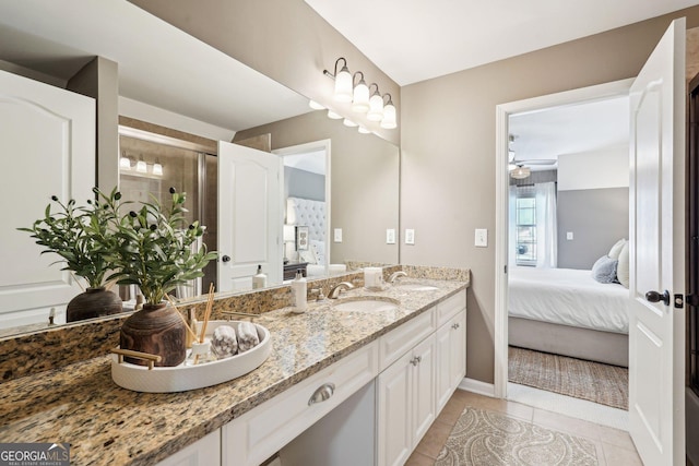 185 Starlight Dr, Dahlonega, GA 30533 - ensuite bathroom with tile patterned flooring, ensuite bathroom, a sink, and ceiling fan