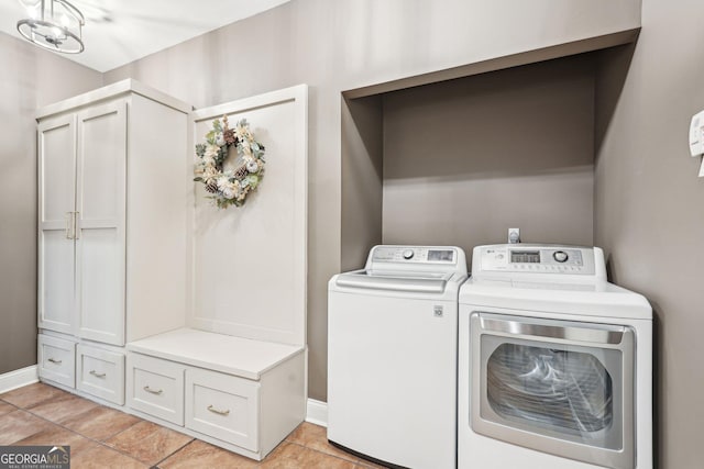 185 Starlight Dr, Dahlonega, GA 30533 - washroom featuring washer and clothes dryer, baseboards, and light tile patterned flooring