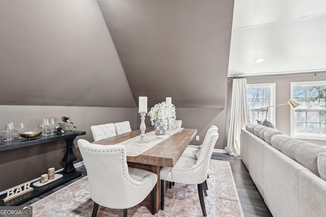 185 Starlight Dr, Dahlonega, GA 30533 - dining area with dark wood-style flooring, baseboards, and vaulted ceiling