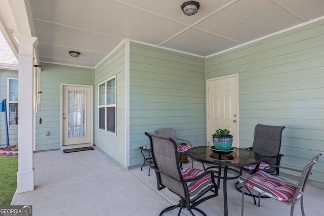 view of patio with outdoor dining space