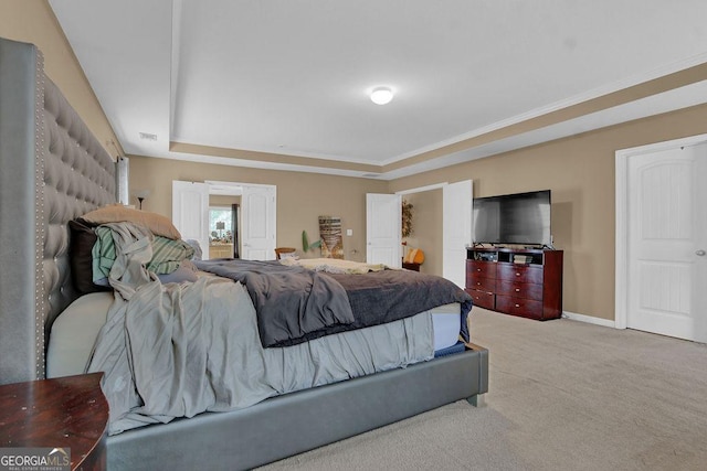 2384 Allsborough Way, Dacula, GA 30019 - carpeted bedroom featuring a tray ceiling, crown molding, and baseboards