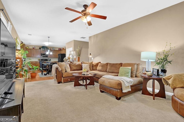 2384 Allsborough Way, Dacula, GA 30019 - living area with a ceiling fan and light carpet