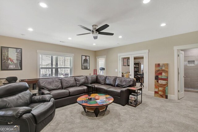 living area with recessed lighting, carpet, baseboards, and ceiling fan