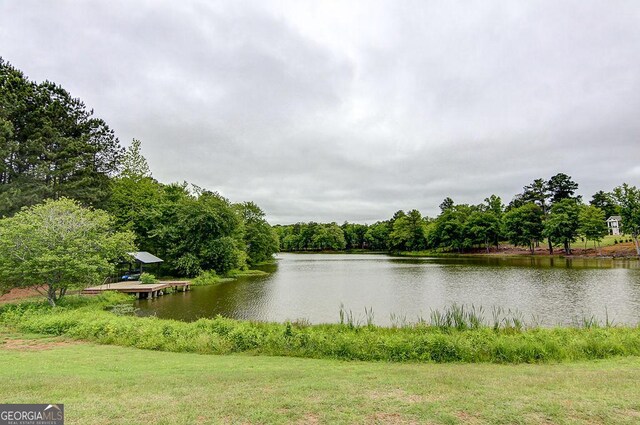 property view of water with a view of trees