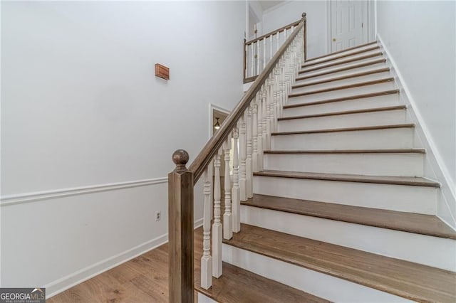 3775 Belle Glade Trl, Snellville, GA 30039 - staircase featuring wood finished floors and baseboards