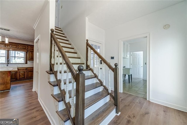 3775 Belle Glade Trl, Snellville, GA 30039 - stairway featuring wood finished floors and baseboards