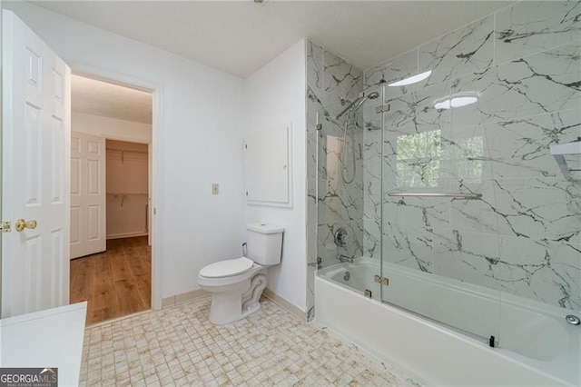 3775 Belle Glade Trl, Snellville, GA 30039 - bathroom with toilet and shower / bath combination with glass door