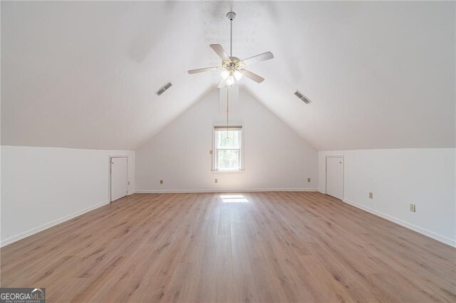 3775 Belle Glade Trl, Snellville, GA 30039 - additional living space featuring light wood finished floors, a ceiling fan, and vaulted ceiling