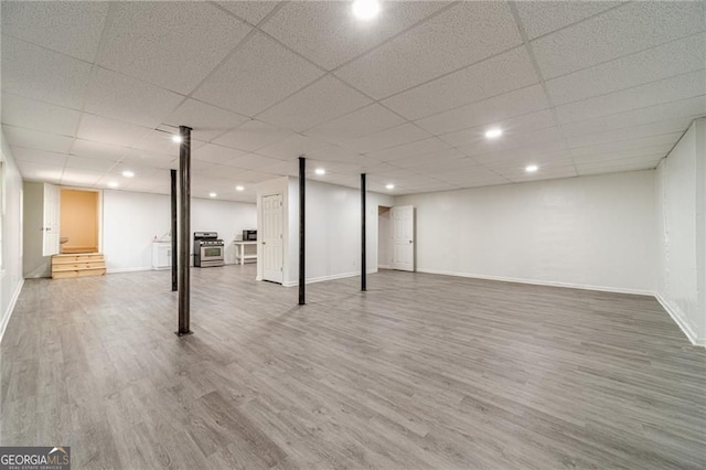 3775 Belle Glade Trl, Snellville, GA 30039 - finished below grade area with wood finished floors, recessed lighting, and a drop ceiling