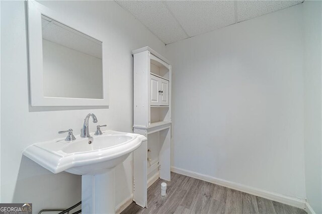 3775 Belle Glade Trl, Snellville, GA 30039 - bathroom with wood finished floors and a paneled ceiling