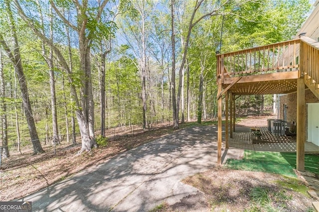 3775 Belle Glade Trl, Snellville, GA 30039 - view of yard featuring a patio and a wooden deck