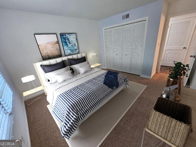 173 Amherst Pl NW, Atlanta, GA 30327 - carpeted bedroom with baseboards, a closet, and visible vents