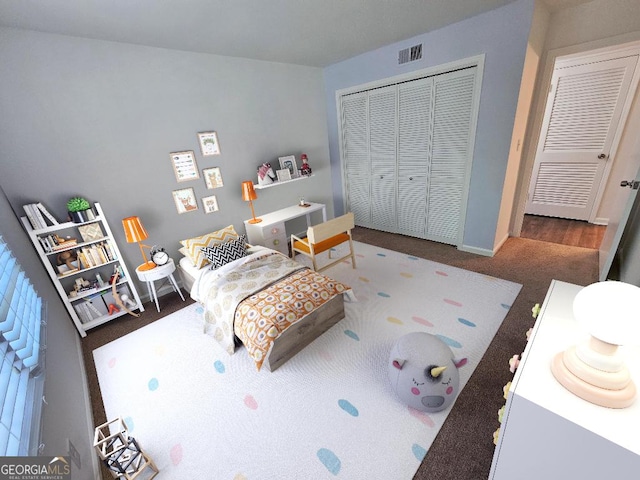 173 Amherst Pl NW, Atlanta, GA 30327 - bedroom featuring visible vents, carpet, baseboards, and a closet