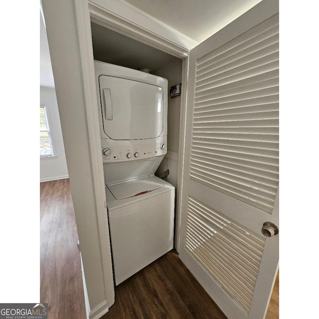 173 Amherst Pl NW, Atlanta, GA 30327 - laundry area with laundry area, dark wood-style floors, and stacked washer / dryer