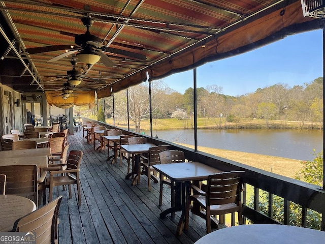 173 Amherst Pl NW, Atlanta, GA 30327 - wooden terrace featuring ceiling fan, an outdoor bar, a water view, a view of trees, and outdoor dining space
