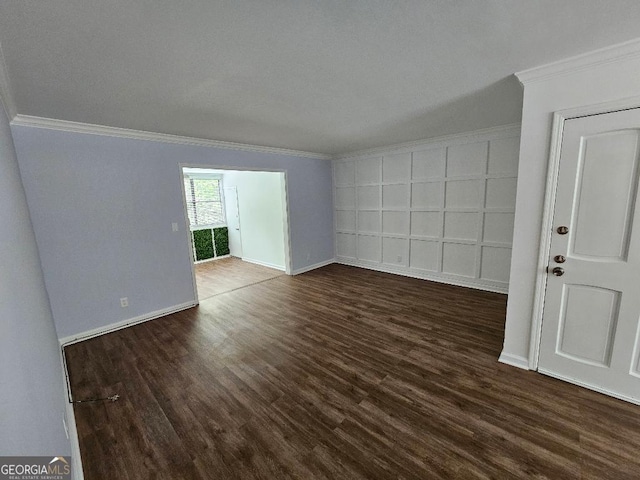 173 Amherst Pl NW, Atlanta, GA 30327 - empty room with baseboards, dark wood-style floors, and ornamental molding
